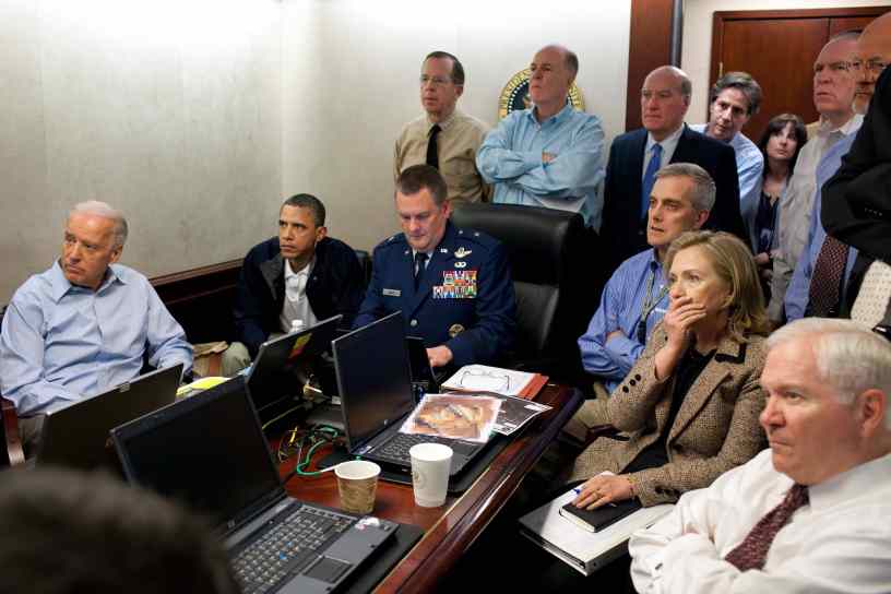 President Barack Obama, Vice President Joe Biden, Secretary of State Hillary Clinton, and other senior officials watch a live feed of the SEAL Team Six raid on Osama bin Laden’s compound from the White House Situation Room, May 2011.